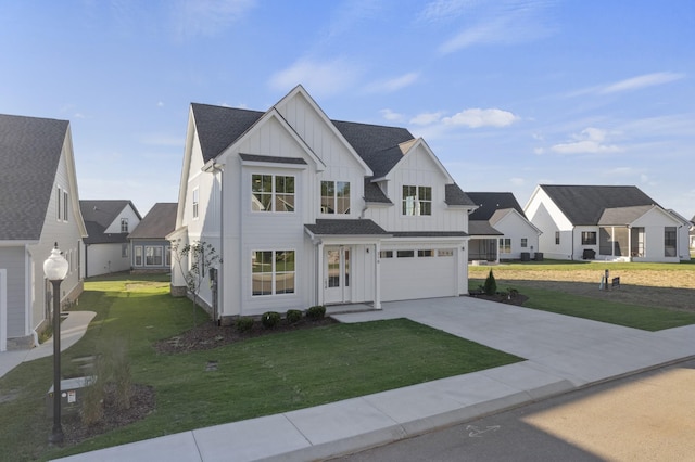 316 Campfire Ct, Winchester, TN 37398 - modern farmhouse with board and batten siding, concrete driveway, a residential view, a front yard, and an attached garage