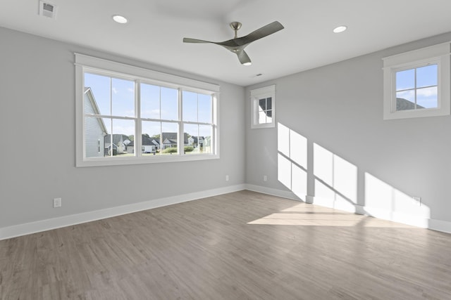 316 Campfire Ct, Winchester, TN 37398 - empty room featuring plenty of natural light, wood finished floors, a ceiling fan, and recessed lighting