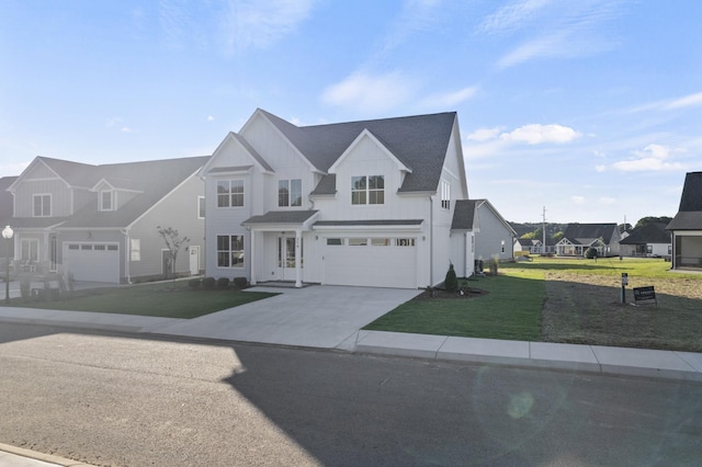 316 Campfire Ct, Winchester, TN 37398 - modern inspired farmhouse with a garage, board and batten siding, driveway, a front yard, and a residential view