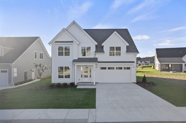 316 Campfire Ct, Winchester, TN 37398 - modern inspired farmhouse with board and batten siding, driveway, a shingled roof, an attached garage, and a front lawn