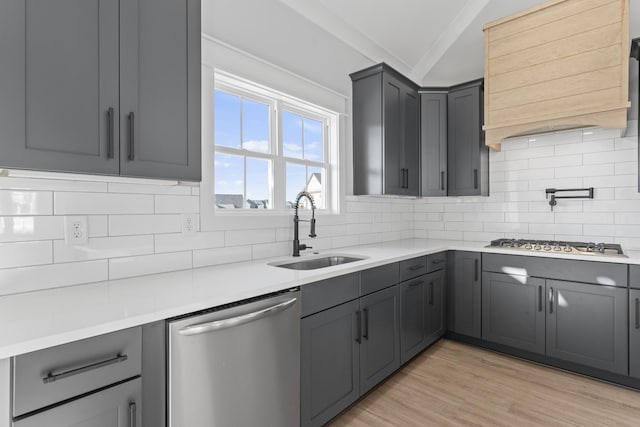 316 Campfire Ct, Winchester, TN 37398 - kitchen with appliances with stainless steel finishes, gray cabinets, wall chimney exhaust hood, and tasteful backsplash