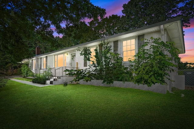 1872 River Rd, Clarksville, TN 37040 - view of front facade with a front yard and a chimney