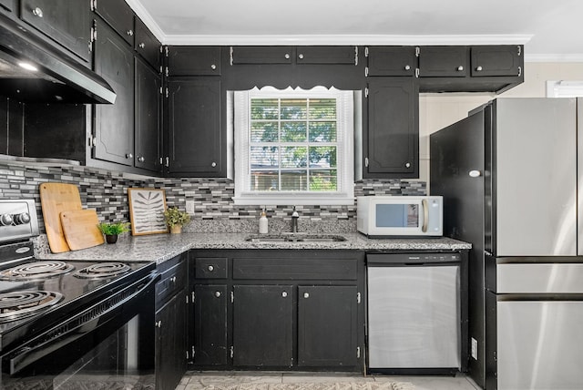 1872 River Rd, Clarksville, TN 37040 - kitchen with freestanding refrigerator, black electric range, stainless steel dishwasher, white microwave, and crown molding