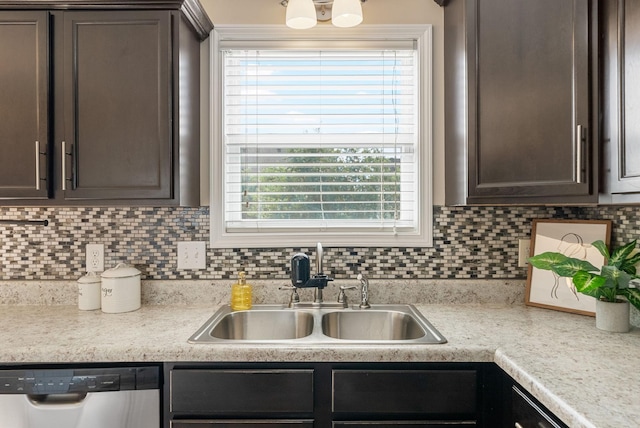 3754 Gray Fox Dr, Clarksville, TN 37040 - kitchen featuring dishwasher, dark brown cabinetry, decorative backsplash, light countertops, and healthy amount of natural light