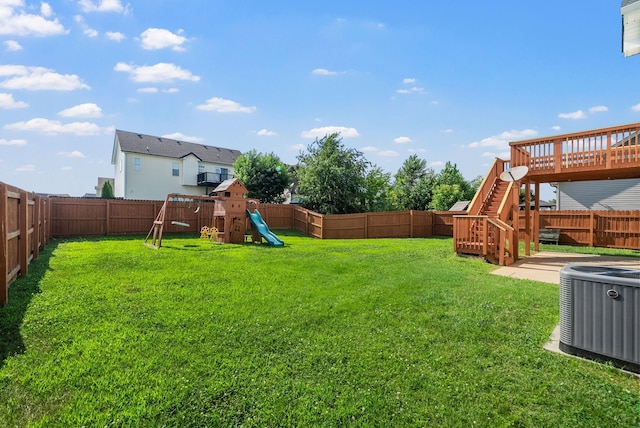 3754 Gray Fox Dr, Clarksville, TN 37040 - fenced backyard featuring a playground, stairway, and a wooden deck