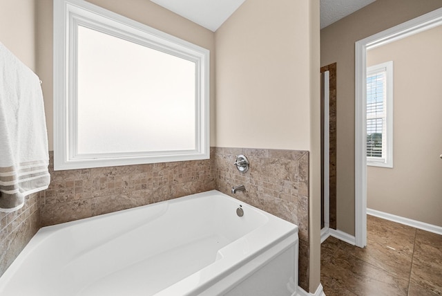 3754 Gray Fox Dr, Clarksville, TN 37040 - full bathroom with a bath and baseboards