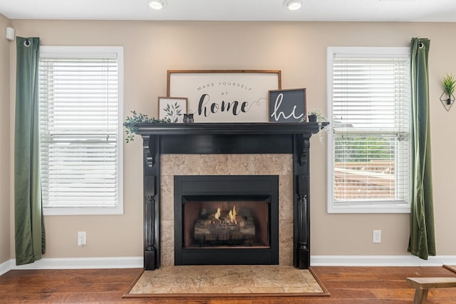 3754 Gray Fox Dr, Clarksville, TN 37040 - detailed view of a lit fireplace, wood finished floors, and recessed lighting
