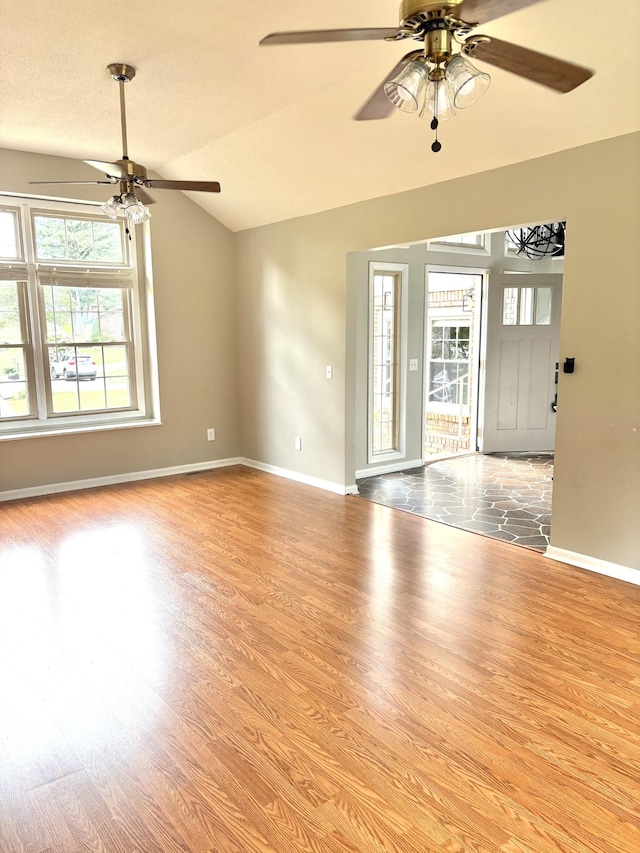 806 Sharon Cir, Lawrenceburg, TN 38464 - unfurnished room featuring ceiling fan, vaulted ceiling, and light wood-style floors