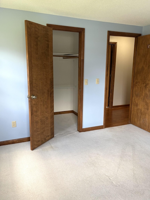 806 Sharon Cir, Lawrenceburg, TN 38464 - unfurnished bedroom with a closet and carpet flooring