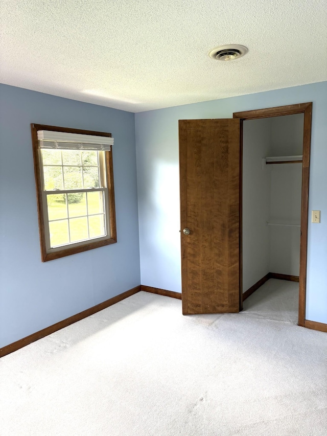 806 Sharon Cir, Lawrenceburg, TN 38464 - unfurnished bedroom featuring carpet and a textured ceiling