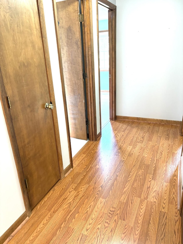 806 Sharon Cir, Lawrenceburg, TN 38464 - hallway with light wood finished floors and baseboards