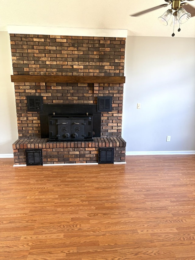 806 Sharon Cir, Lawrenceburg, TN 38464 - detailed view of wood finished floors and ceiling fan