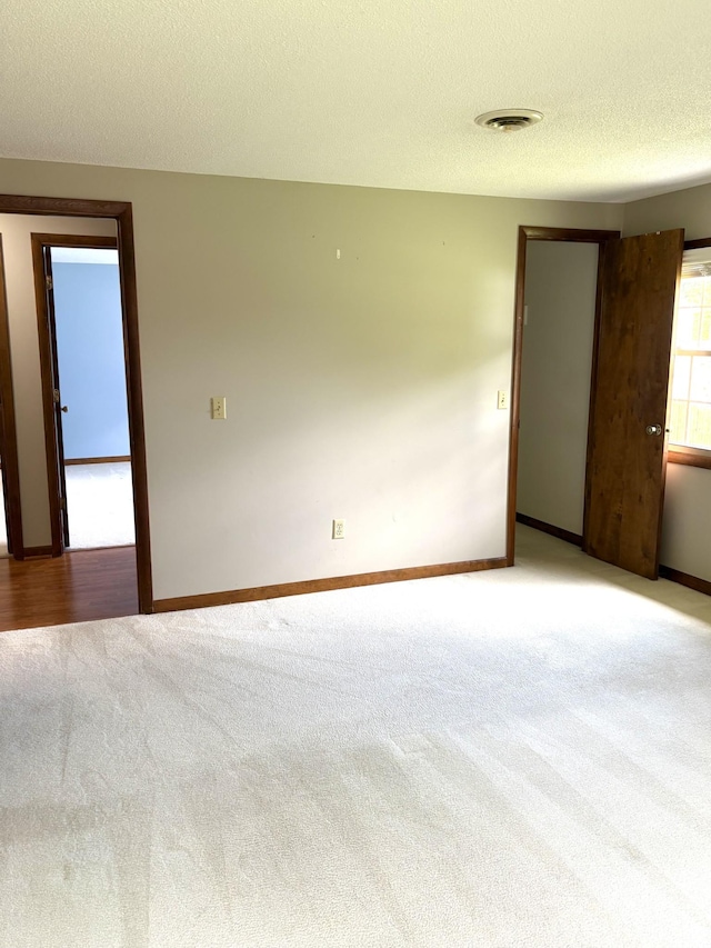 806 Sharon Cir, Lawrenceburg, TN 38464 - empty room featuring carpet flooring and a textured ceiling