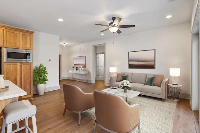 3200 Crockett Pointe, Jasper, TN 37347 - living room with light wood-type flooring, a ceiling fan, and recessed lighting