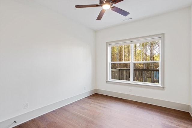 3200 Crockett Pointe, Jasper, TN 37347 - spare room featuring wood finished floors and ceiling fan