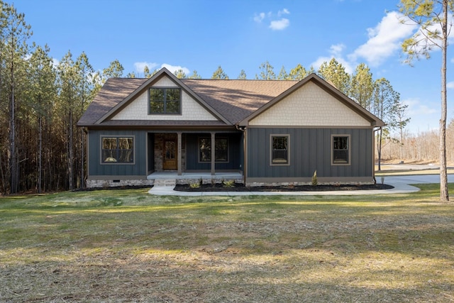 3200 Crockett Pointe, Jasper, TN 37347 - view of front of home featuring covered porch, a front yard, and board and batten siding
