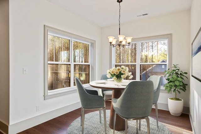 3200 Crockett Pointe, Jasper, TN 37347 - dining area featuring plenty of natural light, a chandelier, and wood finished floors