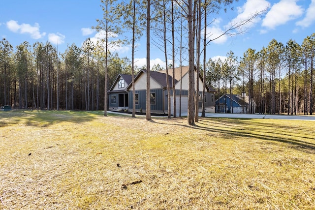 3200 Crockett Pointe, Jasper, TN 37347 - view of front of home with a front lawn and board and batten siding