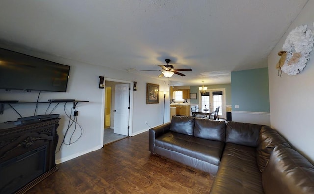 308 Eli Ct, Columbia, TN 38401 - living area featuring ceiling fan, dark wood-type flooring, and a chandelier