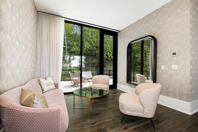 4606 Shys Hill Rd, Nashville, TN 37215 - living area with wallpapered walls, healthy amount of natural light, and wood finished floors
