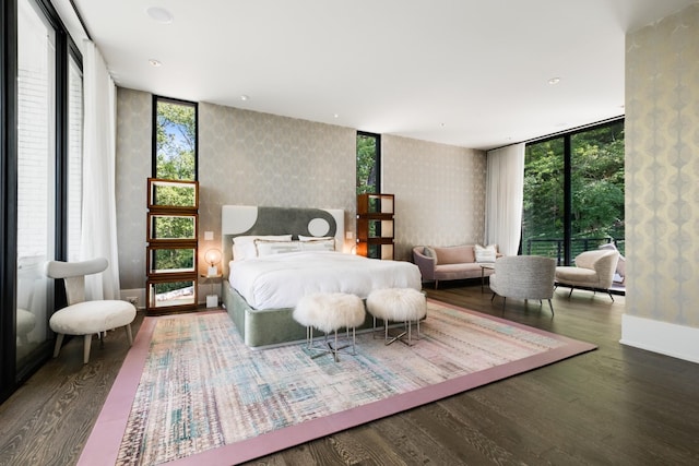 4606 Shys Hill Rd, Nashville, TN 37215 - bedroom with expansive windows, wood finished floors, and wallpapered walls