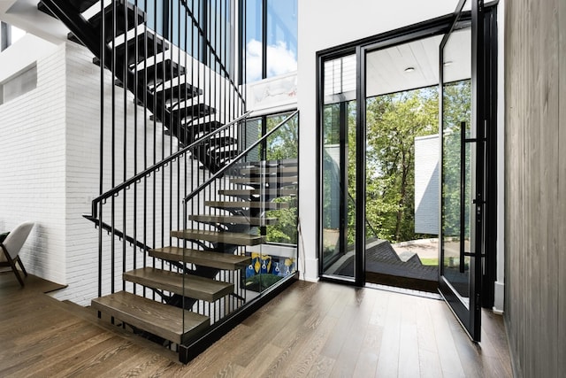 4606 Shys Hill Rd, Nashville, TN 37215 - staircase with wood finished floors, healthy amount of natural light, and a high ceiling