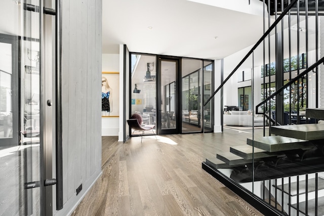 4606 Shys Hill Rd, Nashville, TN 37215 - foyer entrance with wood finished floors, stairs, floor to ceiling windows, and french doors