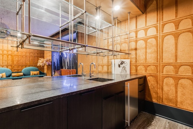 4606 Shys Hill Rd, Nashville, TN 37215 - kitchen featuring dark stone countertops and wood finished floors