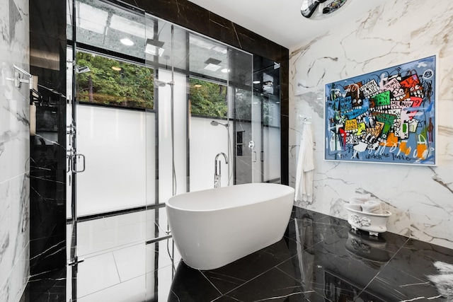 4606 Shys Hill Rd, Nashville, TN 37215 - full bath with a shower stall, tile walls, a freestanding tub, stone wall, and healthy amount of natural light