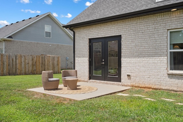 4711 Compassion Ln, Murfreesboro, TN 37128 - back of property featuring french doors, brick siding, a shingled roof, and a patio