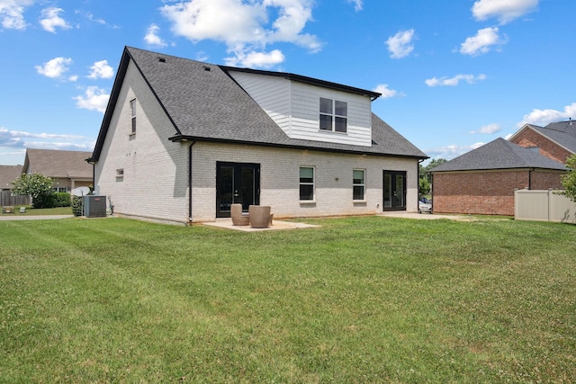4711 Compassion Ln, Murfreesboro, TN 37128 - back of house featuring brick siding, a shingled roof, and a patio area