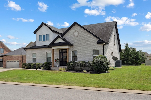 4711 Compassion Ln, Murfreesboro, TN 37128 - view of front facade with a front lawn, brick siding, and a shingled roof