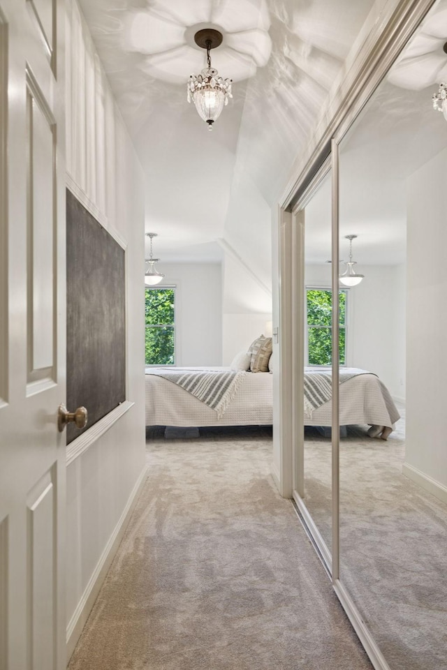 2000 Far Fara Way, Brentwood, TN 37027 - bedroom featuring carpet flooring, multiple windows, and a chandelier