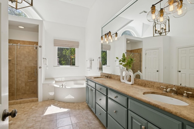 2000 Far Fara Way, Brentwood, TN 37027 - full bathroom with double vanity, a shower stall, a garden tub, a chandelier, and tile patterned flooring