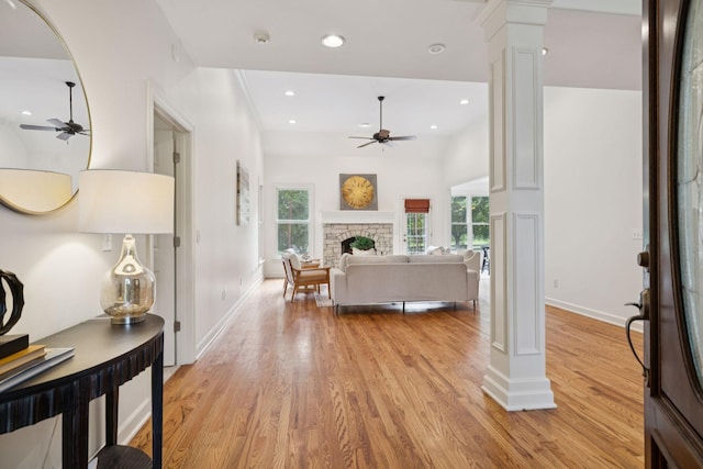2000 Far Fara Way, Brentwood, TN 37027 - living room with a ceiling fan, decorative columns, light wood-style floors, a fireplace, and recessed lighting