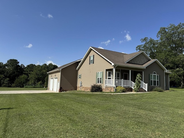 292 District Line Rd, Trenton, GA 30752 - view of front of home featuring a porch, driveway, a garage, and a front lawn
