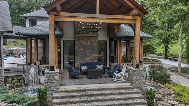 3120 Boxley View Ln, Franklin, TN 37064 - property entrance featuring a shingled roof, an outdoor living space, a deck, and stone siding