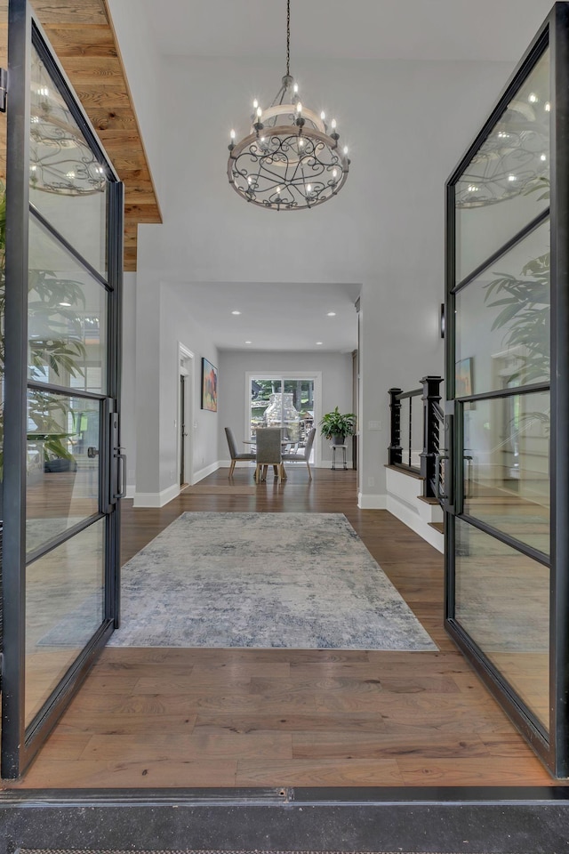 3120 Boxley View Ln, Franklin, TN 37064 - foyer entrance featuring a chandelier, a high ceiling, and wood finished floors