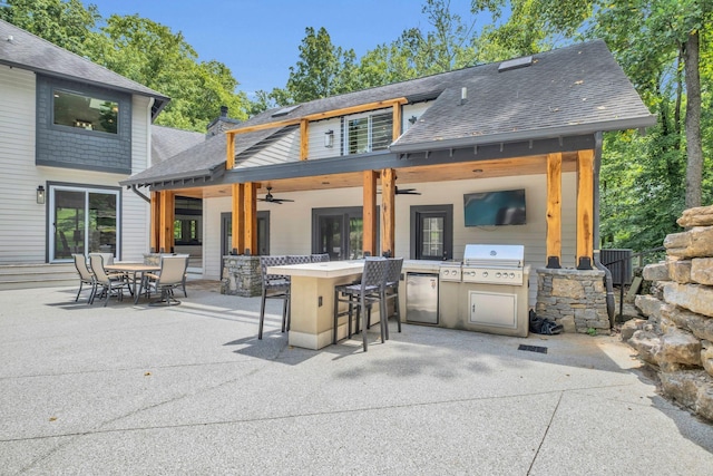 3120 Boxley View Ln, Franklin, TN 37064 - view of patio with a bar, exterior kitchen, and ceiling fan