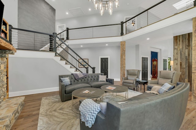 3120 Boxley View Ln, Franklin, TN 37064 - living area featuring a high ceiling, wood finished floors, stairway, and recessed lighting