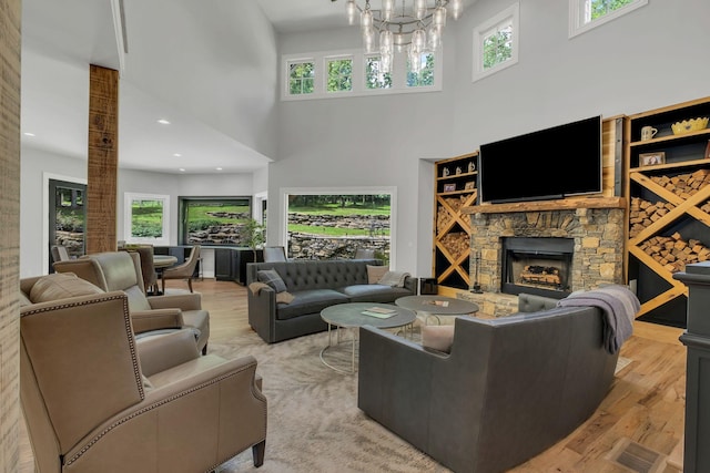 3120 Boxley View Ln, Franklin, TN 37064 - living room with light wood-style flooring, plenty of natural light, a towering ceiling, a chandelier, and recessed lighting