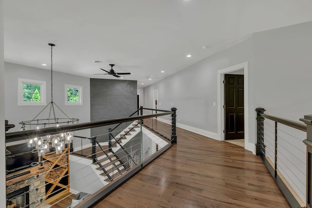 3120 Boxley View Ln, Franklin, TN 37064 - corridor with an upstairs landing, recessed lighting, wood finished floors, and a chandelier