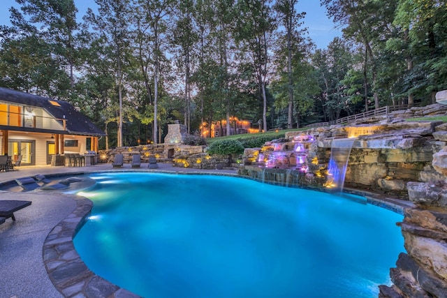 3120 Boxley View Ln, Franklin, TN 37064 - view of pool with a patio, a pool with connected hot tub, and view of scattered trees