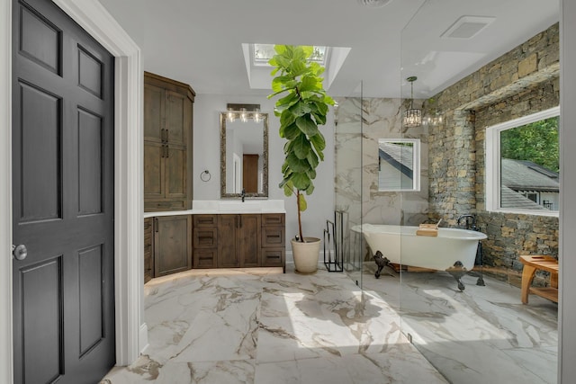 3120 Boxley View Ln, Franklin, TN 37064 - full bathroom with vanity, marble tiled floors, and a freestanding bath