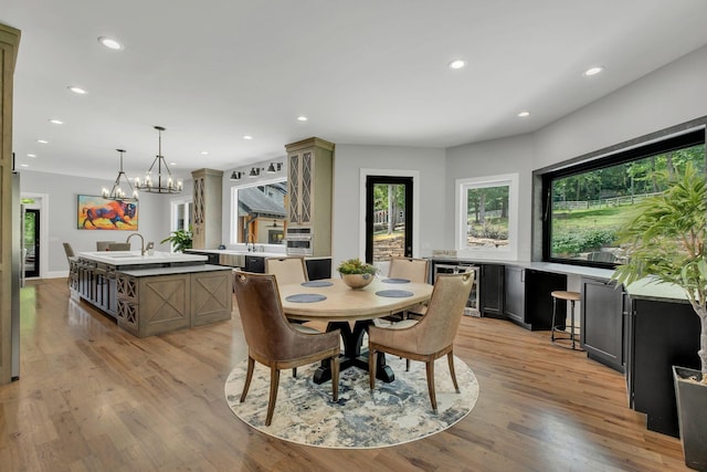 3120 Boxley View Ln, Franklin, TN 37064 - dining space with beverage cooler, healthy amount of natural light, recessed lighting, and light wood-style floors
