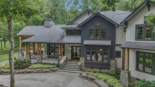 3120 Boxley View Ln, Franklin, TN 37064 - craftsman inspired home featuring a porch, a shingled roof, and a chimney