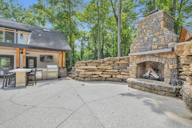 3120 Boxley View Ln, Franklin, TN 37064 - view of patio / terrace featuring an outdoor stone fireplace, an outdoor kitchen, and ceiling fan