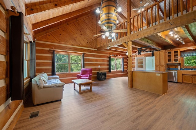 3000 Preston Bagwell Rd, Clarksville, TN 37043 - living area featuring a wooden ceiling with exposed beams, plenty of natural light, light wood-style flooring, a ceiling fan, and high vaulted ceiling