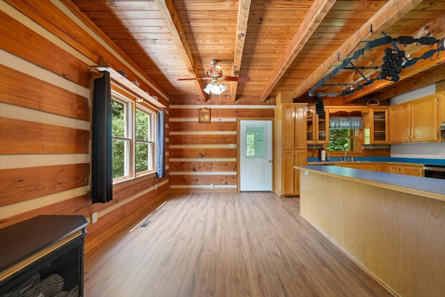 3000 Preston Bagwell Rd, Clarksville, TN 37043 - kitchen with a wood ceiling with exposed beams, light wood-style flooring, wooden walls, glass insert cabinets, and a ceiling fan
