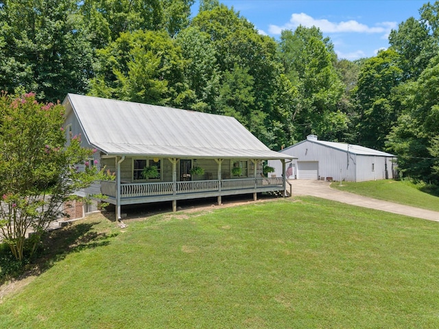 3000 Preston Bagwell Rd, Clarksville, TN 37043 - view of front of home featuring a front lawn, an outdoor structure, a detached garage, and a porch